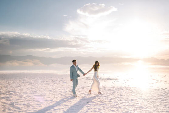 ethereal couple walking on pink sand in Utah by Justin Salem Meyer photography
